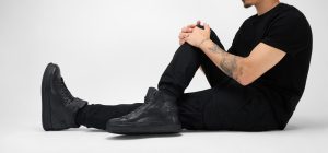 Men-wearing-COLE-black-welted-distressed-high-leather-sneakers-245076.jpg