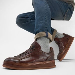 Men-wearing-COLE-cognac-welted-distressed-leather-sneakers-242273.jpg