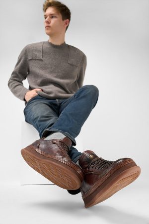 Men-wearing-COLE-cognac-welted-distressed-leather-sneakers-242299.jpg