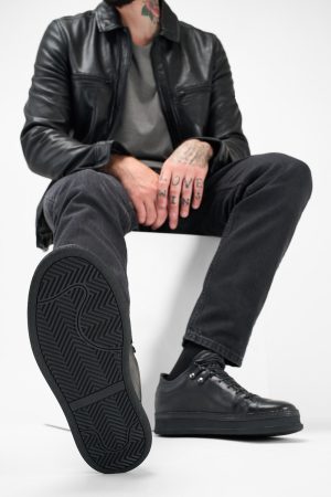 Men-wearing-COLE-rugged-black-welted-distressed-leather-sneakers-24849.jpg