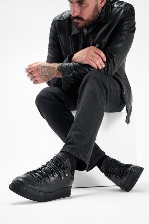 Men-wearing-COLE-rugged-black-welted-distressed-leather-sneakers-24896.jpg