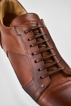 SKYE-cognac-studded-patina-leather-sneakers-MACROS-SNEAKERS02133.jpg