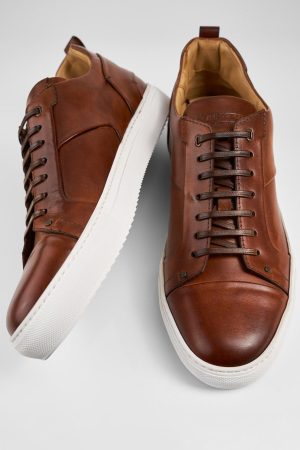 SKYE-cognac-studded-patina-leather-sneakers-SNEAKERS01089.jpg