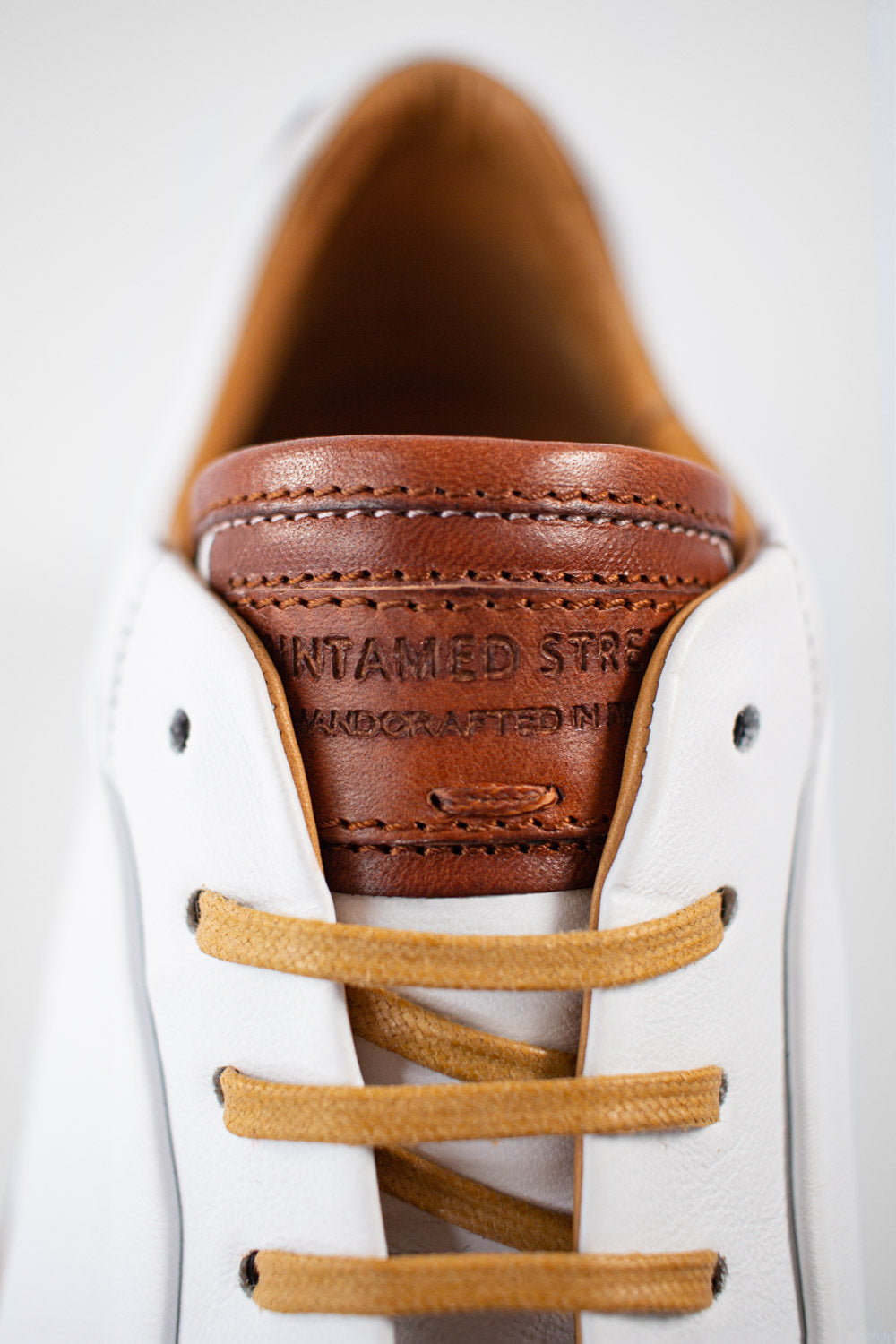 SOHO_men_sneakers-trainers-low_white-cognac-brown_luxury_calf-leather_patina-minimalist_made-in-italyIMG_0530.jpg